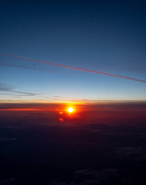 istock Sky over the clouds on sunrise from airplane 2214226860