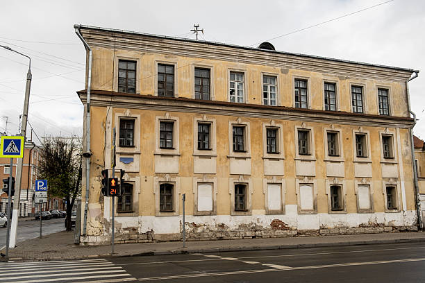 istock Old Building Facade with Traffic Light at Crosswalk 2214228653