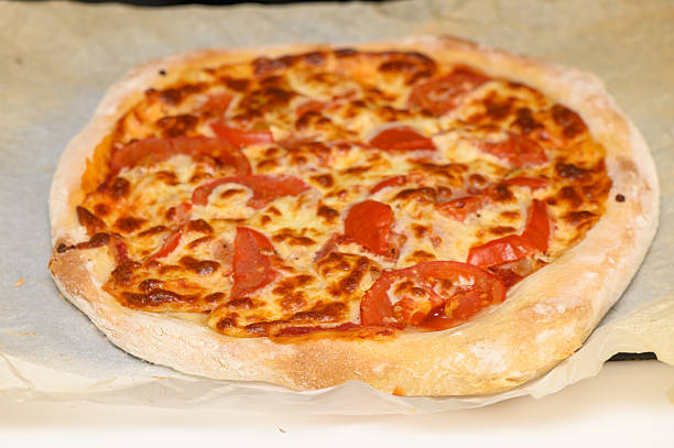 istock Delicious Bacon, Cheese, and Tomato Pizza 2214232261