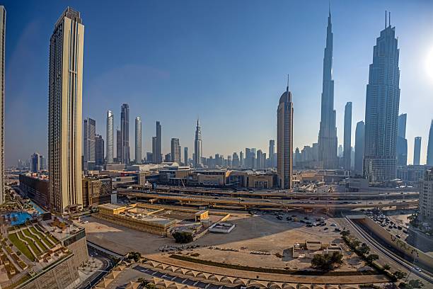 istock Famous Dubai skyline at sunset 2214232382