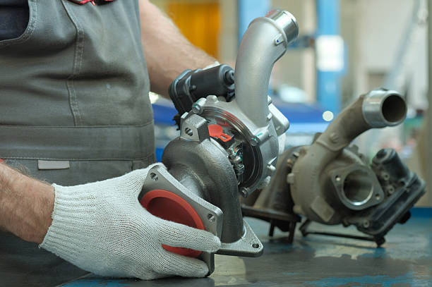 istock Car engine repair at a car service station. 2214232407