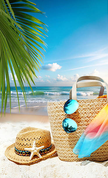 istock An original beautiful composition with beach accessories for a design on the theme of a summer holiday at sea. 2214233591
