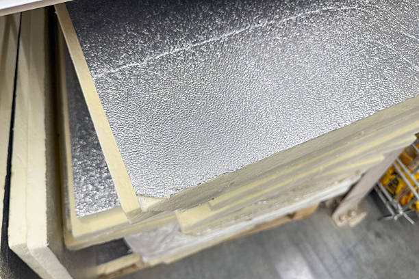 istock Insulation foil-clad polystyrene foam in a hardware store, close up 2214233753