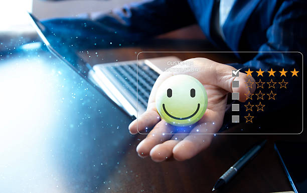 istock User give rating to service experience on online application for Customer review satisfaction feedback survey concept. 2214234174
