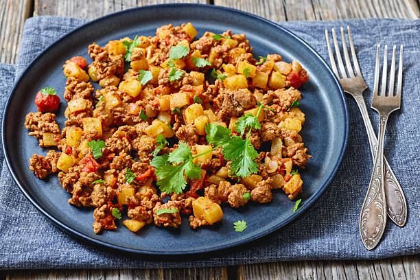 istock ground beef stew of potatoes and chopped tomatoes 2214248907