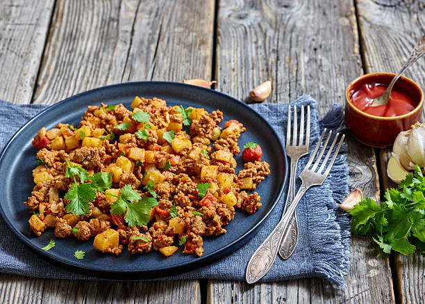 istock ground beef stew of potatoes and chopped tomatoes 2214249269