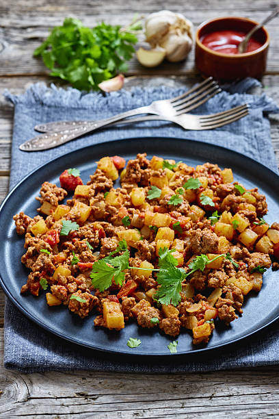 istock ground beef stew of potatoes and chopped tomatoes 2214249270