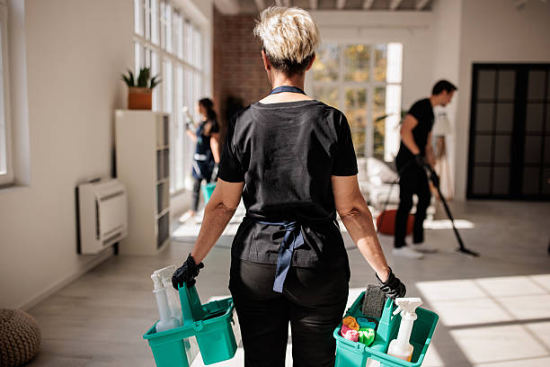 istock Cleaner with Supplies Joining Team 2214252671