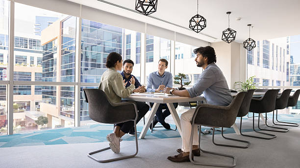 istock Multiethnic business team discussing collaboration, partnership, planning strategy 2214252897