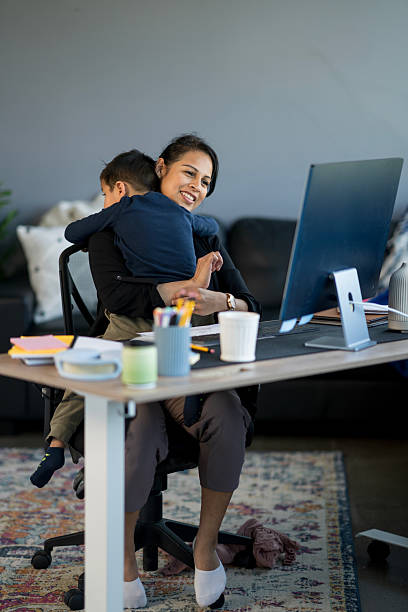 istock Mother Balancing Work From Home While Caring for Her Child 2214258045