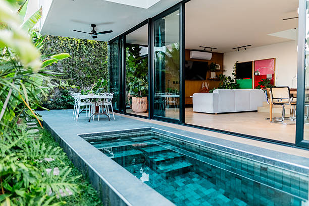 istock Swimming pool on back yard at home 2214259890