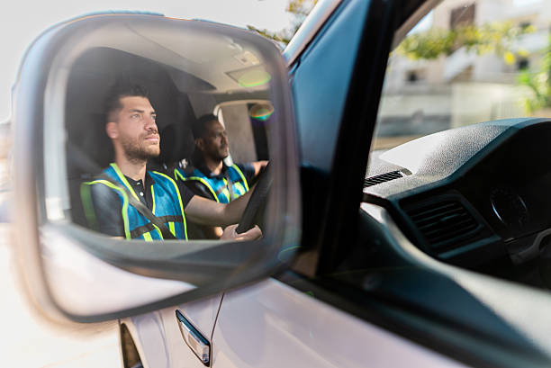 istock Young delivery man driving van 2214259898