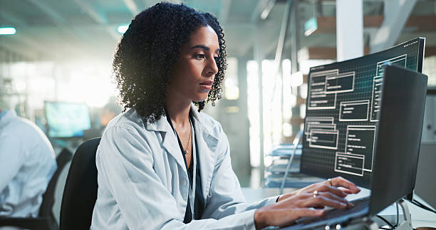istock Laptop, computer screen and woman in laboratory with research for data analysis, development and innovation. Science, STEM and medical study with scientist, technology and typing results online 2214265802