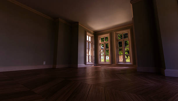 istock Empty room with parquet flooring and open windows overlooking a garden 2214272085