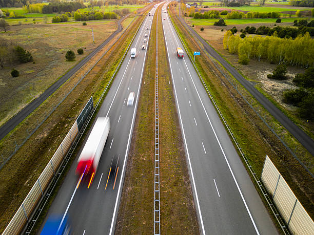 istock Evening Blur of Highway Traffic 2214272378