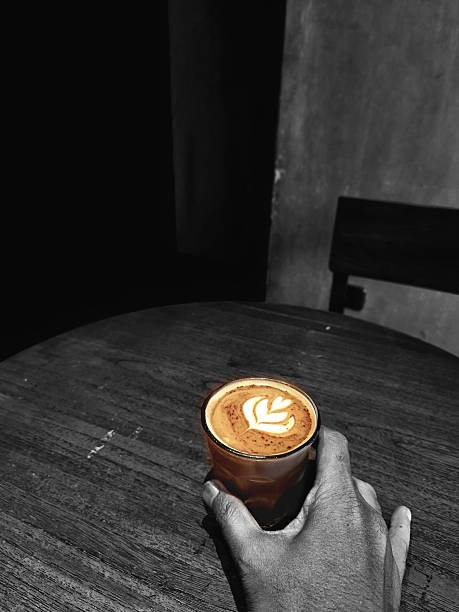 A cup of cappuccino photo when taking break on the coffee shop