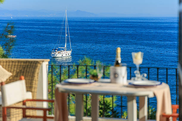 istock Terrace dining table with sea view in Liguria 2214278476