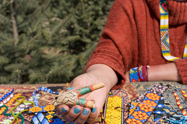istock Shaman holding a tepi pipe for kambo ritual in mexico 2214284426