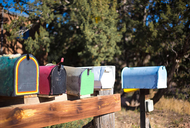 istock Santa Fe, NM: Line of Colorful Classic Rural US Mailboxes 2214288573