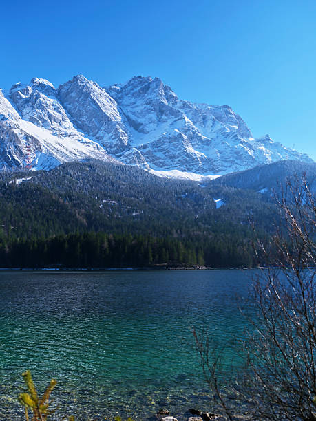 istock Stunning mountain landscape with clear lake under bright blue sky during daytime 2214288725