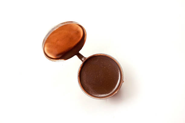 istock top view of chocolate sauce for dipping, isolated on white background 2214290475