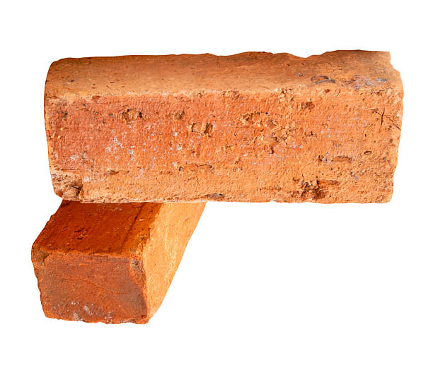 istock Side view of two old red or orange bricks isolated on white background with clipping path 2214296533
