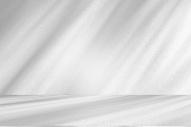 istock Wall interior background, studio and backdrops show products.with shadow from window color white . background for text insertion and presentation product 2214300498