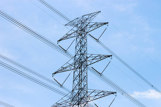 istock Pictures of High voltage electric pole in blue sky background. 2214317849