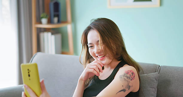 istock woman video chat on phone 2214319394