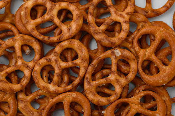 istock Pretzel with salt baked crunchy snacks close up 2214319416