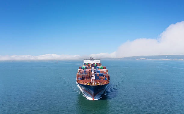 istock Aerial front view of a large sized, loaded container cargo vessel in transit. 2214322249