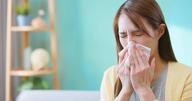 istock Asian woman home cold symptoms 2214323863