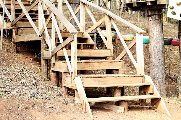 istock Beautiful wooden staircase in the forest. 2214324962