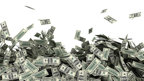 istock Dollar bills falling on heap of US 100 dollar notes 2214325364