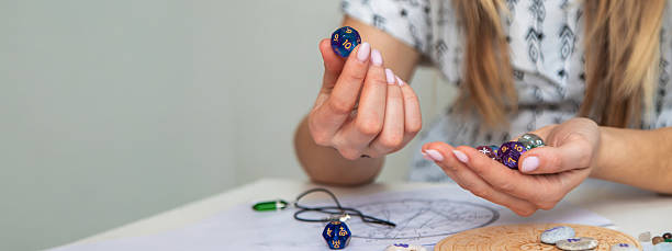 istock Woman numerologist astrologer counts numbers. Selective focus. 2214336442
