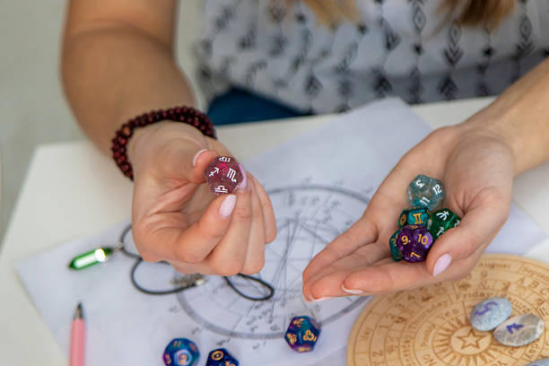 istock Woman numerologist astrologer counts numbers. Selective focus. 2214336452