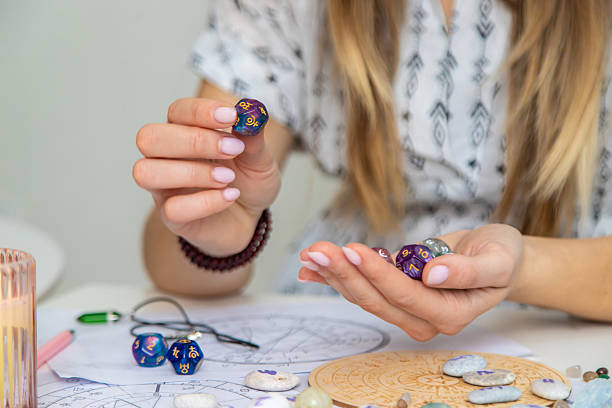 istock Woman numerologist astrologer counts numbers. Selective focus. 2214336457