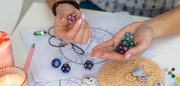 istock Woman numerologist astrologer counts numbers. Selective focus. 2214336460