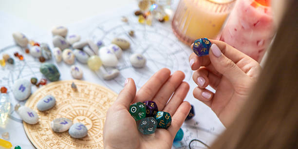 istock Woman numerologist astrologer counts numbers. Selective focus. 2214336464