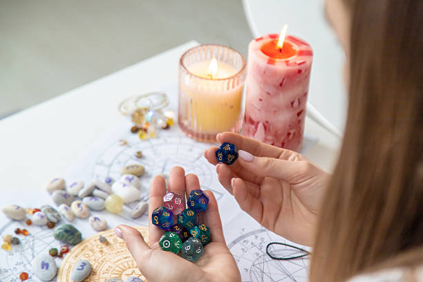 istock Woman numerologist astrologer counts numbers. Selective focus. 2214336468