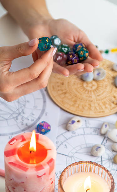 istock Woman numerologist astrologer counts numbers. Selective focus. 2214336469