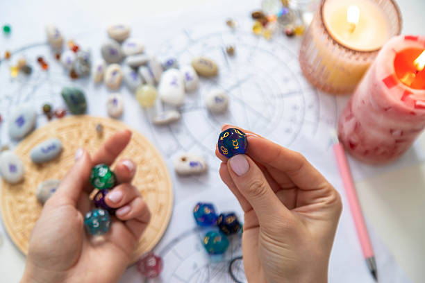 istock Woman numerologist astrologer counts numbers. Selective focus. 2214336473