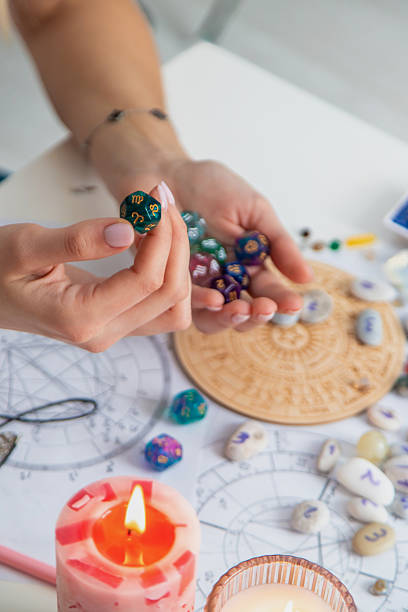 istock Woman numerologist astrologer counts numbers. Selective focus. 2214336475
