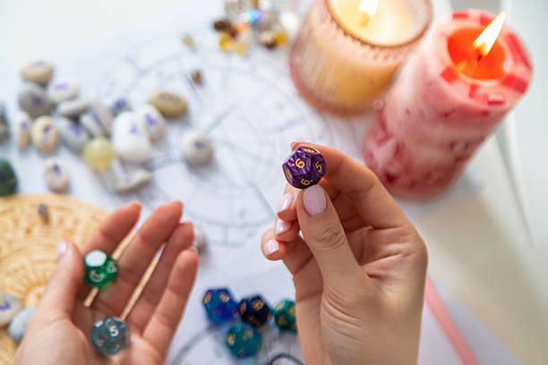 istock Woman numerologist astrologer counts numbers. Selective focus. 2214336476