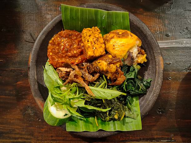 istock Traditional Indonesian southeast Cuisine on Earthenware Plate 2214344503