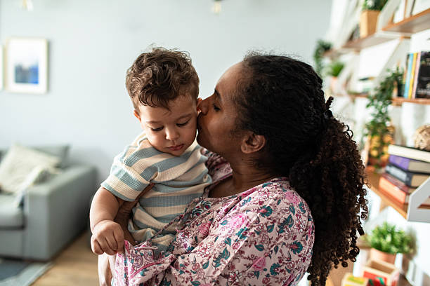 istock Young mother with her son at home 2214346924