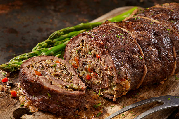 istock Red Pepper Stuffed Flank Steak Roulade 2214355304