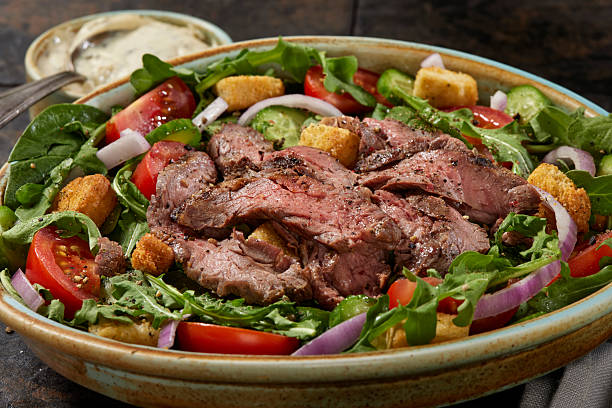 istock Succulent Medium Rare Flank Steak Salad 2214356379