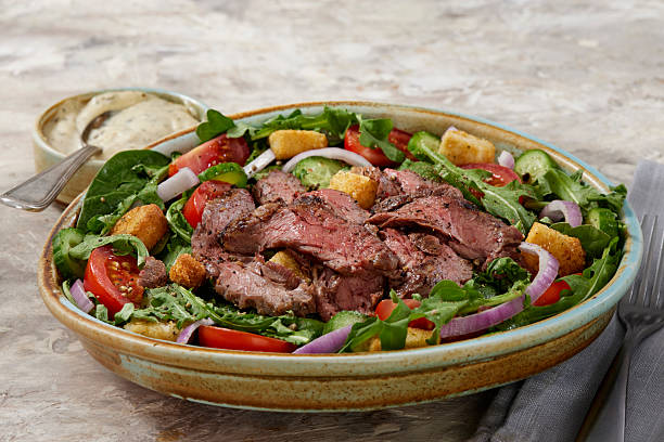 istock Succulent Medium Rare Flank Steak Salad 2214356387