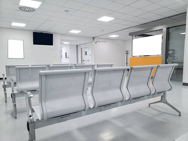 istock Empty Hospital Waiting Room with Modern Chairs 2214360943